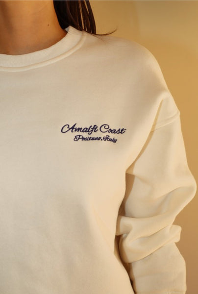 close up of "Amalfi Coast" stitching in navy blue