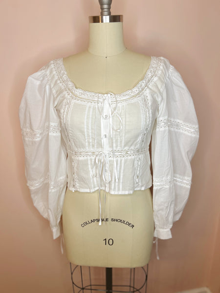 white blouse on mannequin 